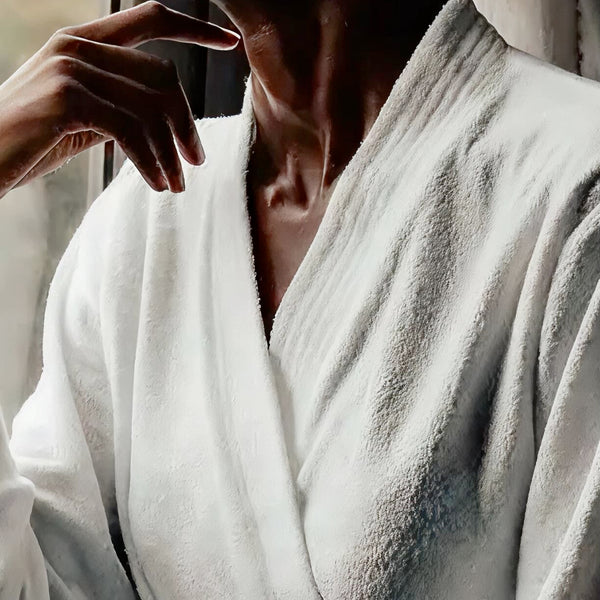 woman wearing a white bathrobe
